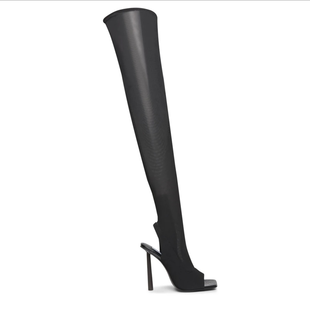 Brand new. Never worn. Steve Madden Beverly open toe boots. Size 9.